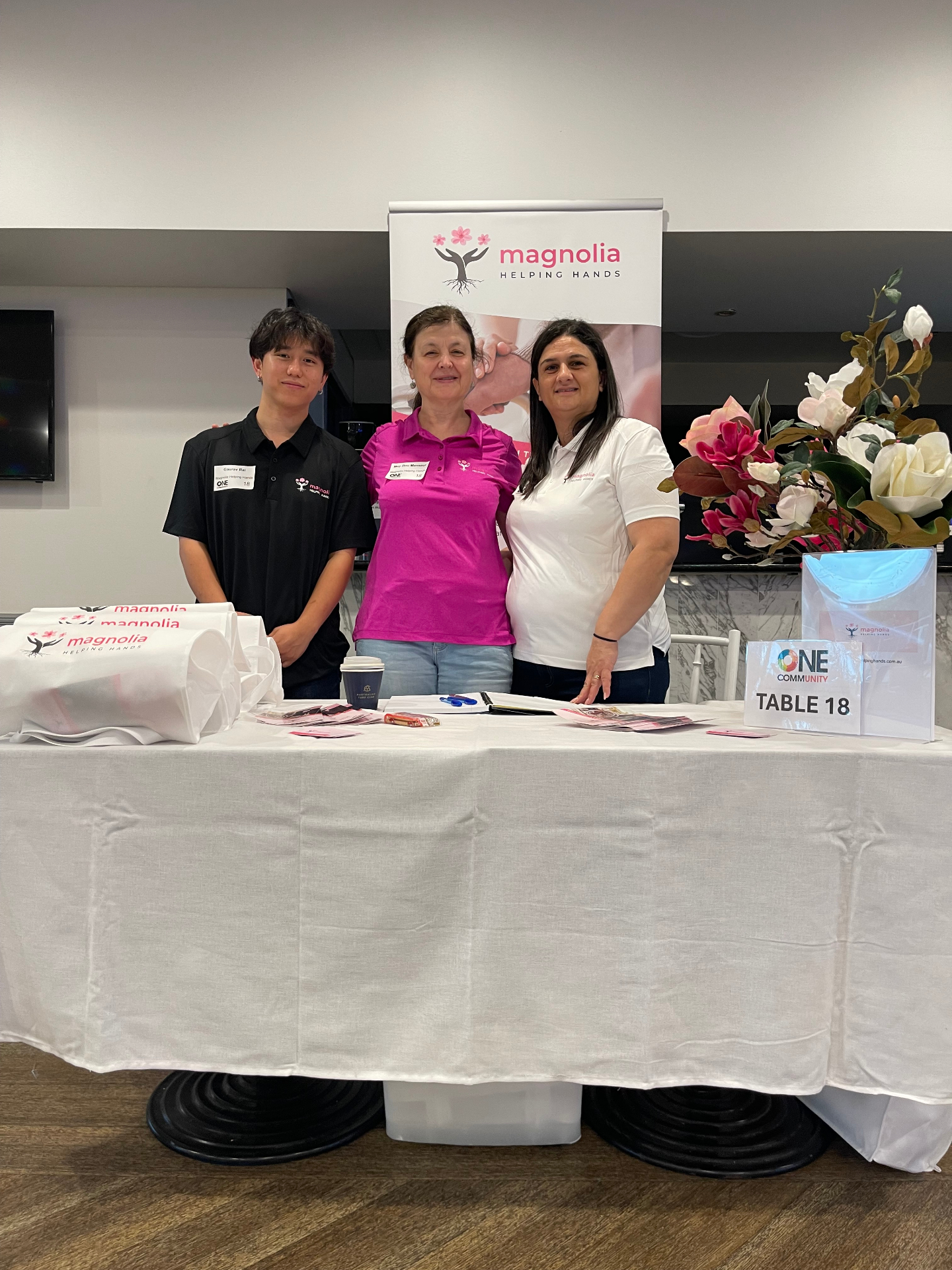 May and the Magnolia team at community event